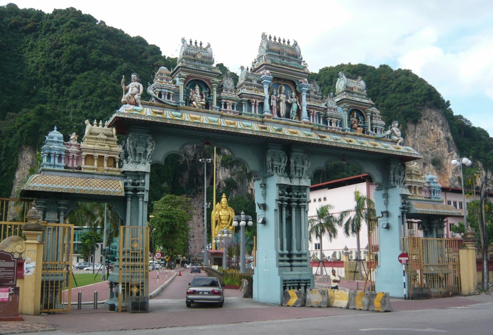 Entrance to Batu Caves near Kuala Lumpur. Visitors are "welcomed" by a 43m-high statue of Murugan, the Hindu God of war